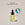 A clear glass bottle with a dropper containing organic Argan Oil next to a circle displaying old packaging and text calling out: New look , same proven formula